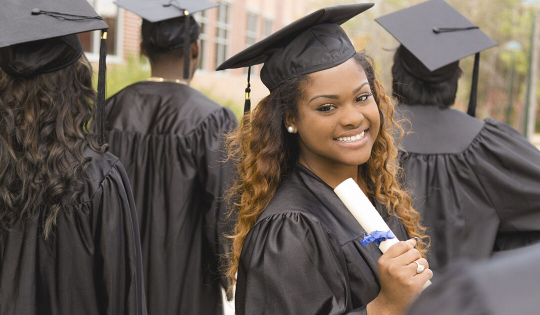 College grad with diploma 550px