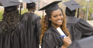 College grad with diploma 1200px